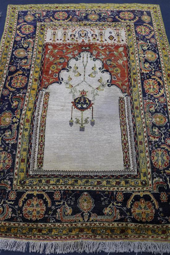 A Persian prayer rug, 6ft 4in. x 4ft 6in.